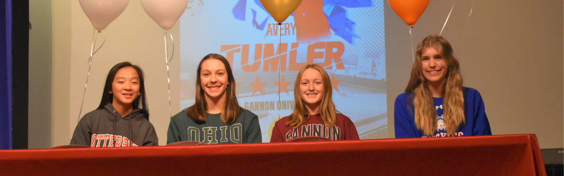 Kings student athletes sign letters of intent; Abby Rawlings, Melanie Schweikert, Avery Tumler, and Riley Wells. 